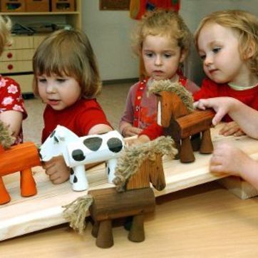 Afbeelding van spelende kinderen in het kinderdagverblijf.